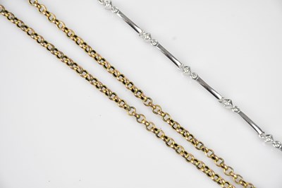 Lot 32 - A white metal bracelet set with clear stones,...