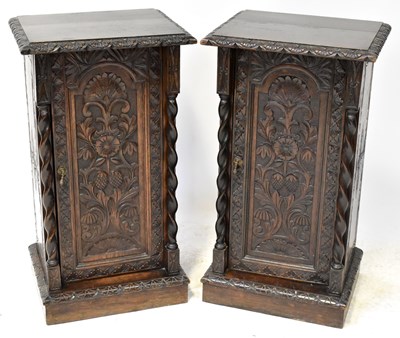 Lot 53 - A pair of Victorian carved oak bedside...