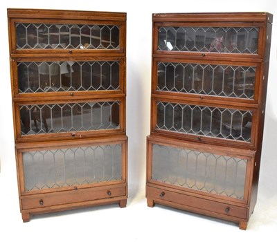 Lot 9 - GLOBE-WERNICKE; a pair of four-tier bookcases,...