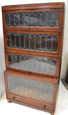 Lot 9 - GLOBE-WERNICKE; a pair of four-tier bookcases,...