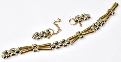 Lot 905 - A 9ct yellow and white gold part chain link...