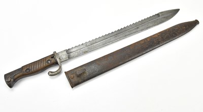 Lot 1071 - A 98/05 sawback bayonet, the blade inscribed...