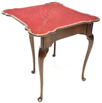 Lot 18 - An early 20th century oak triangular fold-over...