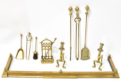 Lot 774 - A 19th century extending brass fender with...