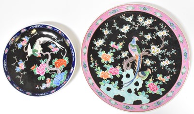Lot 192 - A Chinese Famille Noire charger decoration...