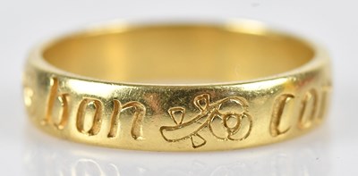 Lot 430 - An 18ct yellow gold wedding band, inscribed...