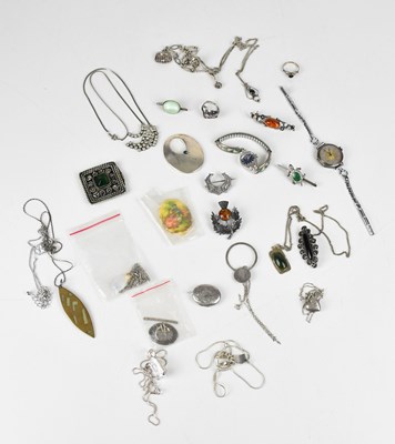 Lot 699 - A collection of sterling silver, white metal...