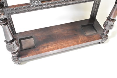 Lot 35 - A Victorian carved oak hall stand, the top...