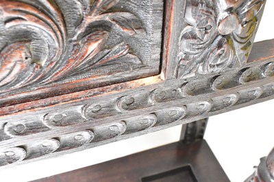 Lot 35 - A Victorian carved oak hall stand, the top...