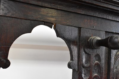 Lot 35 - A Victorian carved oak hall stand, the top...