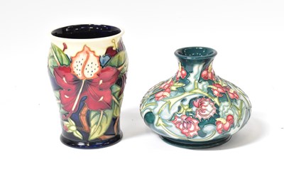 Lot 140 - MOORCROFT; a 'Leicester' pattern squat vase of...