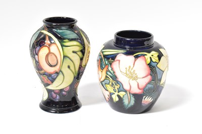 Lot 142 - MOORCROFT; a 'Queen's Choice' pattern vase of...