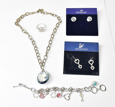 Lot 996 - SWAROVSKI; five boxed items of jewellery,...