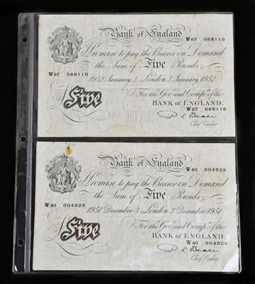 Lot 602 - THE BANK OF ENGLAND; two white £5 notes, chief...
