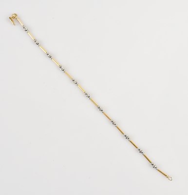 Lot 43 - A 9ct yellow and white gold bracelet, length...