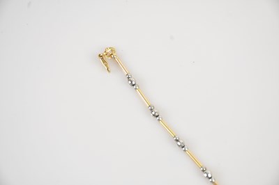 Lot 43 - A 9ct yellow and white gold bracelet, length...