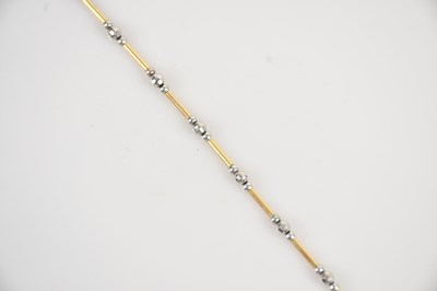 Lot 43 - A 9ct yellow and white gold bracelet, length...