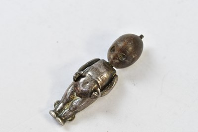 Lot 651 - FUMS UP; a WWI lucky charm, a miniature figure...