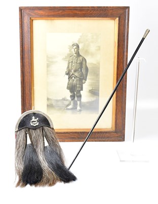 Lot 638 - A white metal mounted ebonised swagger stick,...