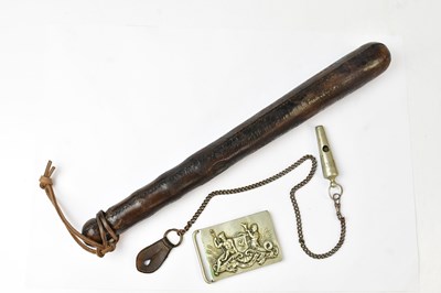 Lot 639 - A vintage leather covered truncheon, impressed...
