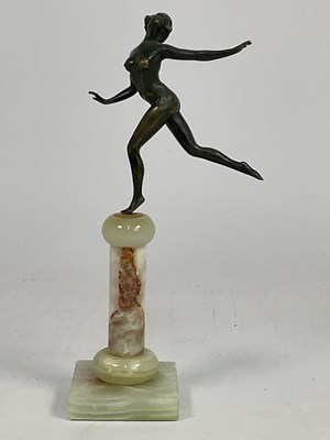 Lot 21 - A 1970s Art Deco bronzed brass nude figure of...