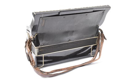 Lot 30 - PIGLIACAMPO; an piano accordion in case,...
