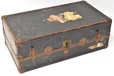 Lot 542 - A vintage metal bound steamer wardrobe trunk...