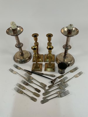 Lot 587 - A pair of ecclesiastical style candlesticks,...