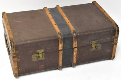 Lot 545 - A vintage wooden bound canvas-covered steamer...