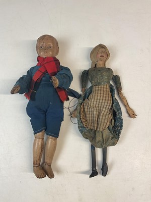 Lot 78 - Two early 20th century European wooden dolls,...
