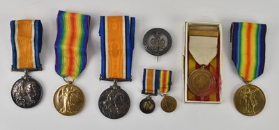 Lot 514 - Two pairs of WWI medals, both including...