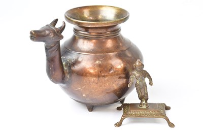 Lot 201 - A brass figure depicting an Indian deity,...