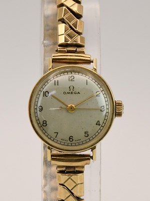 Lot 1801 - OMEGA; a vintage lady's 14ct yellow gold cased...
