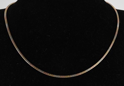 Lot 1472 - A 9ct tricolour gold box link necklace, length...