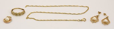 Lot 1343 - A 9ct yellow gold 'knot' ring, set with three...