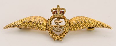 Lot 1526 - A 9ct yellow gold sweetheart wing brooch, with...