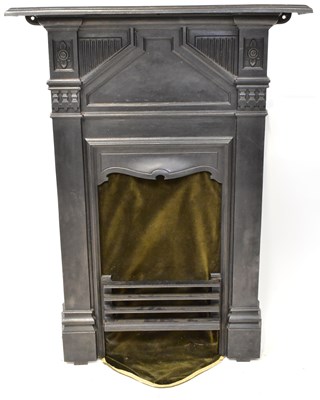 Lot 67 - A Victorian-style cast metal fireplace and...