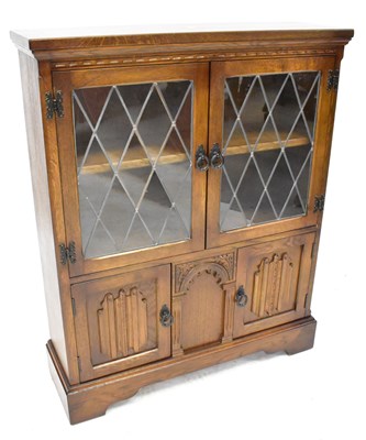 Lot 38 - A reproduction oak leaded and glazed display...