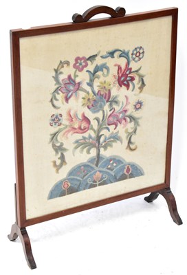 Lot 59 - An Edwardian mahogany framed fire screen with...