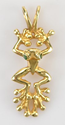 Lot 338 - A yellow metal pendant of a frog, stamped 14K,...