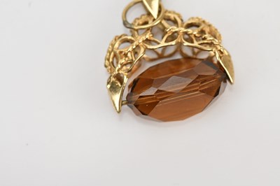 Lot 30 - A 9ct yellow gold swivel fob with faceted...