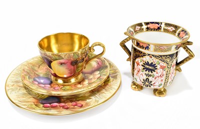 Lot 715 - ROYAL CROWN DERBY; a twin handled footed vase,...