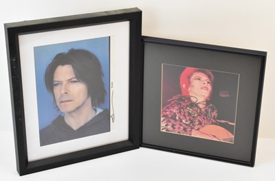 Lot 315 - DAVID BOWIE; two signed photo images of David...