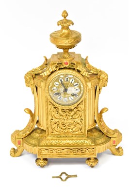 Lot 60 - A late 19th century French gilt metal mantel...