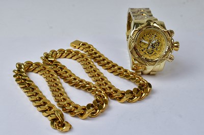 Lot 105 - INVICTA; an American-style gilt steel...