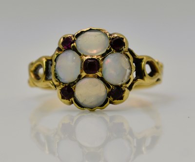 Lot 448 - A Victorian yellow metal opal and ruby cluster...