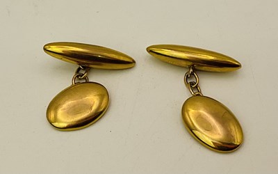 Lot 487 - A pair of 9ct yellow gold oval faced cufflinks,...