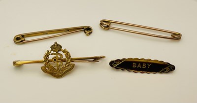 Lot 465 - A 9ct yellow gold bar brooch inscribed 'Baby',...