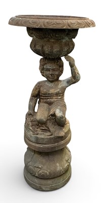 Lot 230 - An early 20th century cast iron figural garden...