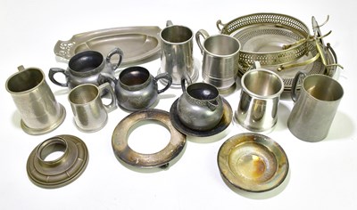 Lot 1160 - A quantity of pewter to include teapots, mugs,...